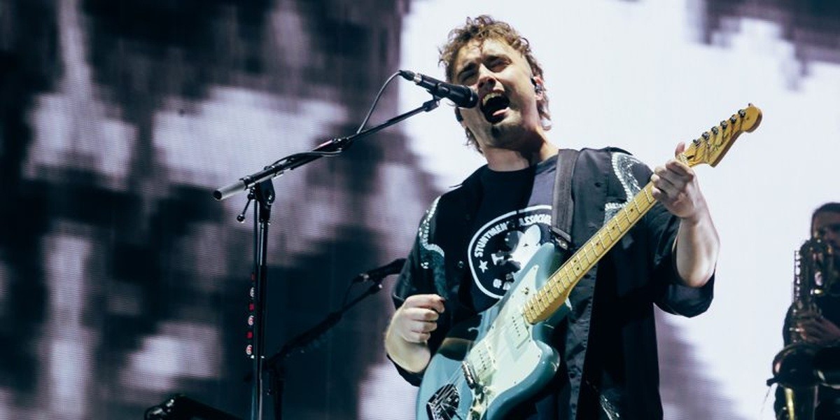 Sam Fender performing on stage at Reading Festival in 2023