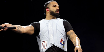 drake reschedules manchester concert amid travel challenges, promises unforgettable return