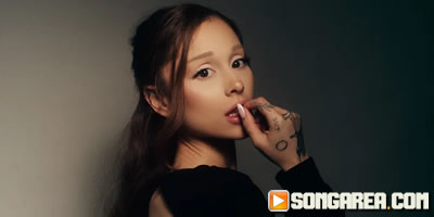 ariana grande slashes through critics in gory ‘petal’ music video